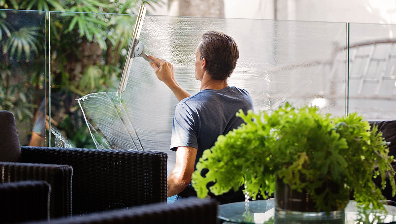 Man cleaning window service-1